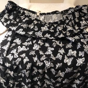 A black butterfly dress